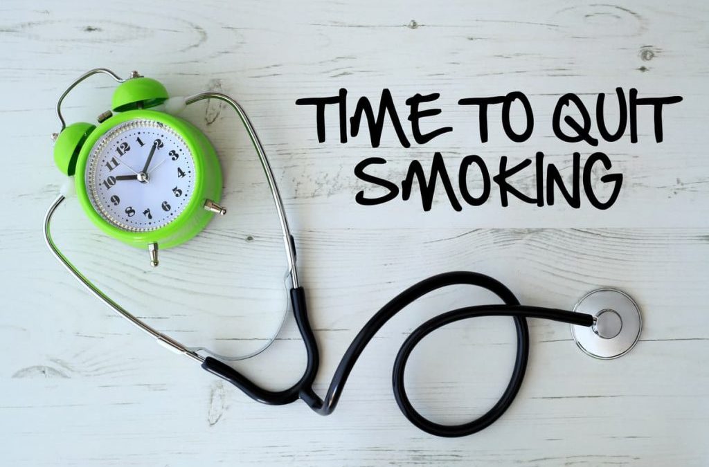 Image logo for Great American Smokeout. The image says Time to Quit Smoking with a stethoscope and an alarm clock